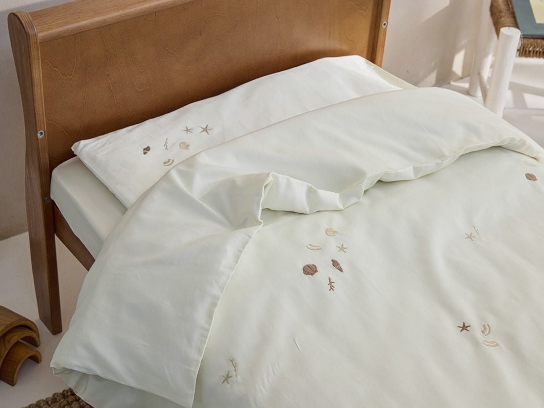 Housse de couette enfant satin de coton coquillage blanc chaud