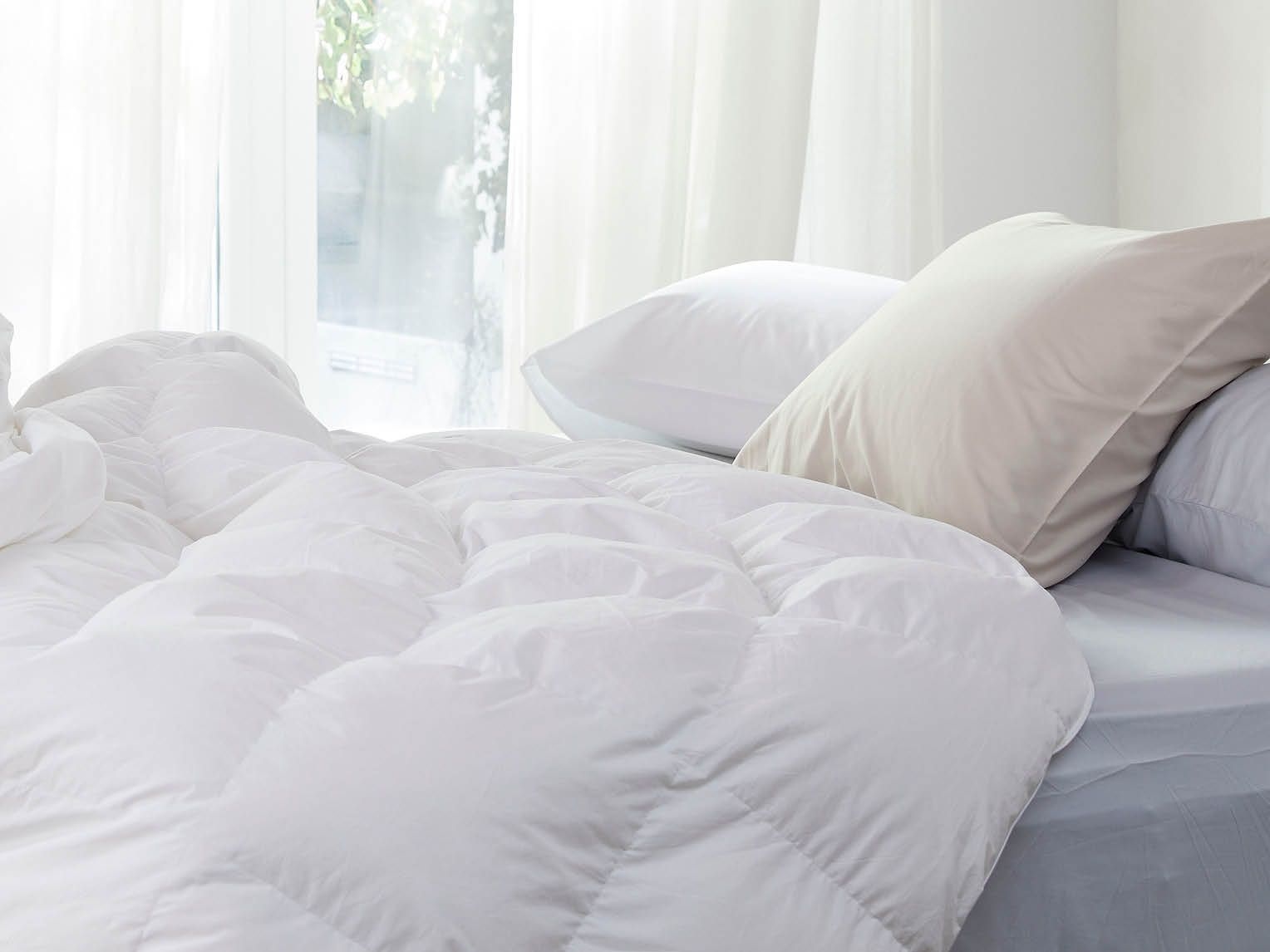 Couette en duvet deluxe tempérée